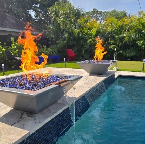 Pair of fire and water bowls glowing at dusk