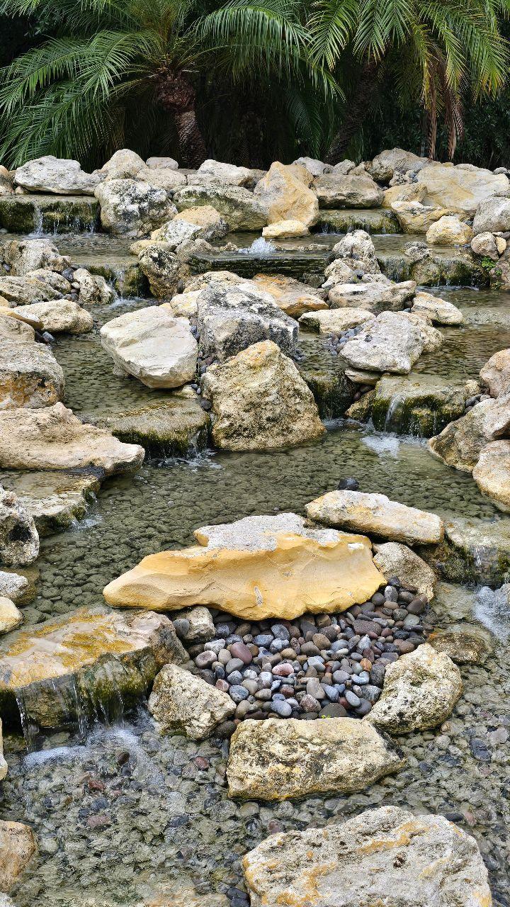 Pondless stream with flagstone steps and lush plantings